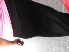 Fat ass Mexican in see thru black skirt