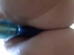 Russian youthful woman masturbating with a blue sex-toy