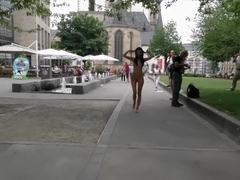 Kira walks completely nude in a German town