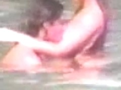 Naked couple at beach - voyeur video