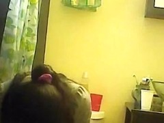 Peeing young chick caught caught on spy camera