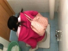Chicks pissing in the public toilet and being filmed with a spy cam