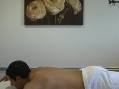 Busty oriental wankedoff masseuse jerking client