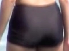 Fat ass voyeured on cam in the latex swimsuit shorts 07b