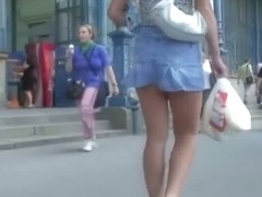 Spy cam porno vid of a brunette babe in a jean skirt walking around