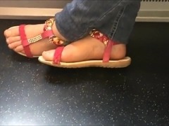 Candid feet on train 9