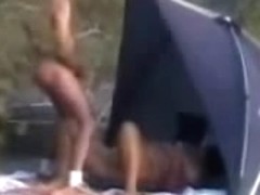Mature bitch masturbates for voyeurs at nude beach