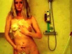 Skinny blondie showering