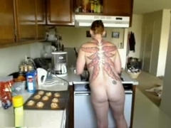 Red Haired Babe Masturbating In The Kitchen
