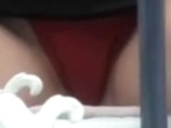 Alluring red panties caught on voyeur's camera