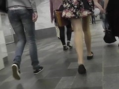 Upskirt in public with slender brunette hottie