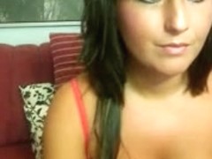 Short-haired brunette masturbating with a sex toy on webcam