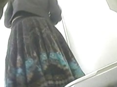 Hidden cam in wc shoots girl lifting skirt up above bowl
