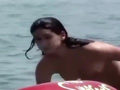 Cute nudist girl filmed voyeur at the beach