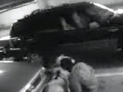 Parking garage sex on security camera with a charming blonde