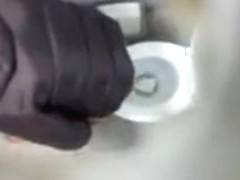 Ceiling cam films a girl peeing in the toilet