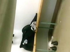 Locker room cam captures her shaved pussy