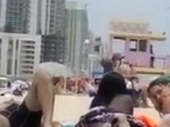 Two naked goddesses on the beach of Miami