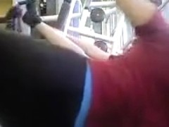 Sporty ass brunette works out in the gym