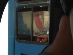 Another angle to girl in bus