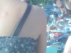 Candid downblouse of the amateur fem in the street