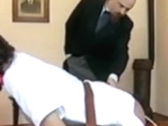 Perverted headmaster caning his teen pupil