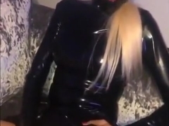 Sexy blonde playing in latex