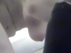 Bushy pussy and erected nips on the spy cam in changing room