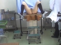 Asian girl in the hidden cam gyno medical examination