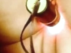 Fat woman filmed herself with a lighted vibrator in her pussy