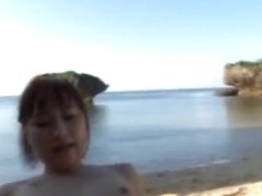 Yukiko Suo gets fucked by two guys at the beach.