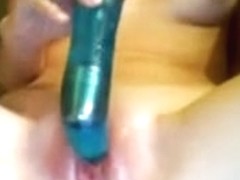 Amazingly hot blonde rubbing her clit and playing with a sex toy
