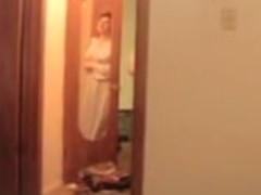 Mature takes off bath robe and shows nude body thru window
