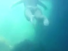 Nudists in the Crimea in 2011. Underwater girl.1