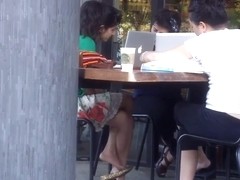 Candid double crossed legs by a sexy indian girl