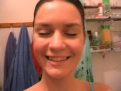 Hot girlfriend masturbates in a shower