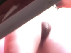 Erected clit between nub lips of changing room mature