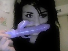 Emo chick playing with a new sex toy