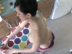 Cute babe ironing in a great topless down blouse video