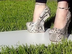 Heel less snakeskin 7 inch high shoes
