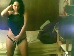Chubby woman dancing and stripping in her bedroom