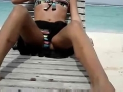 Sexy wife masturbating at the beach